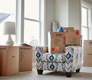 moving boxes in a senior apartment for downsizing
