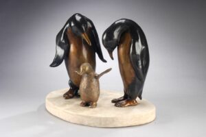 bronze sculpture of penguins